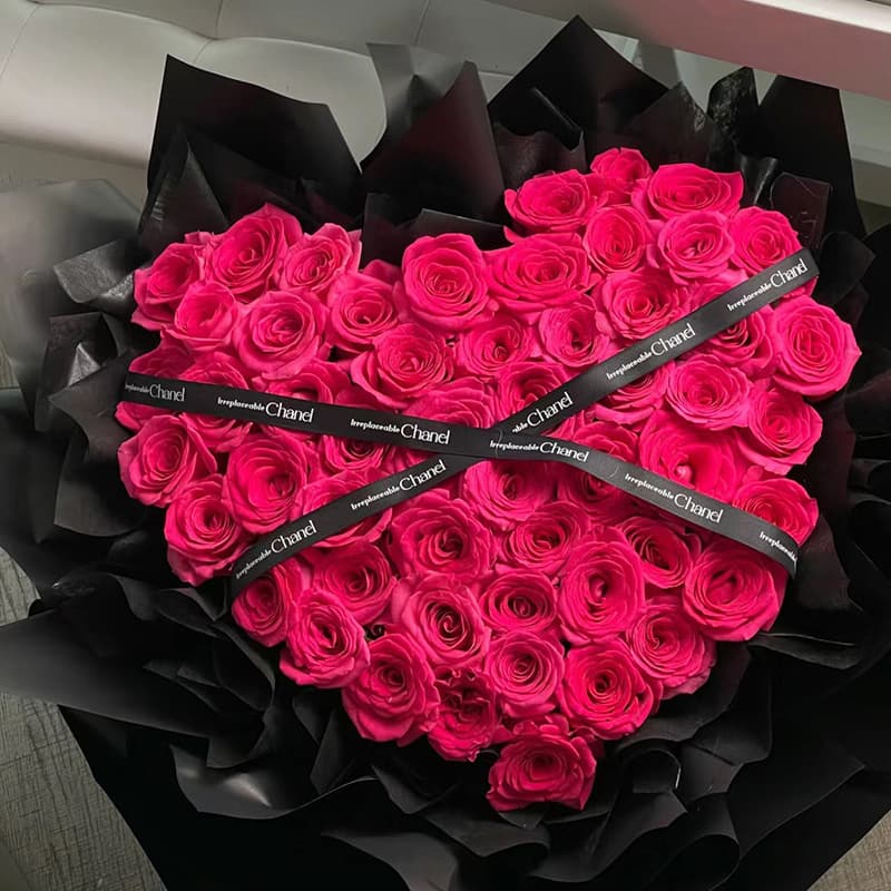 Filled with love, 52 Freud roses are packaged into a heart shape. - Send birthday flowers to China