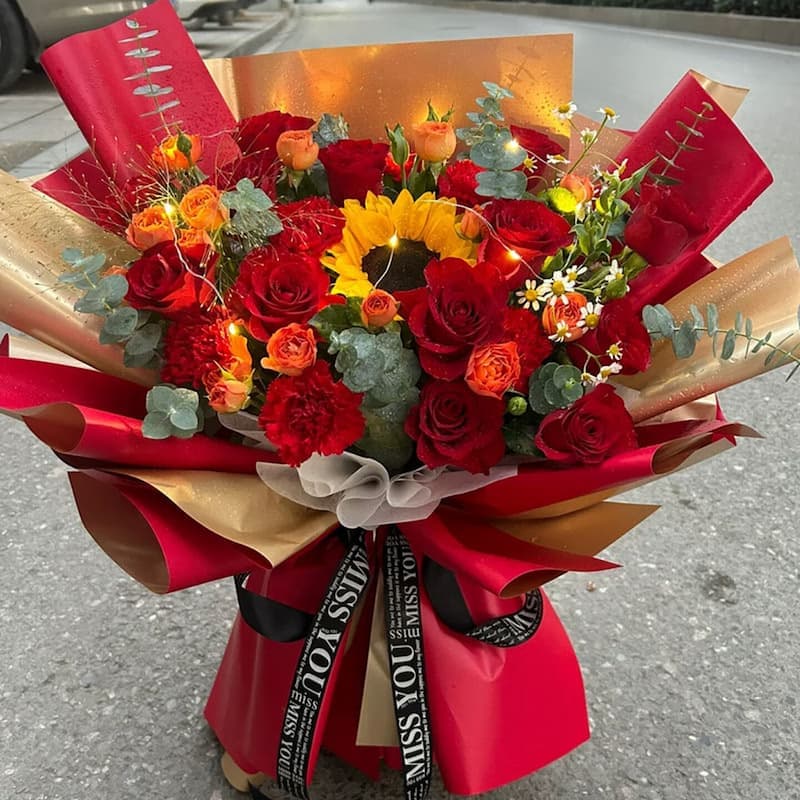 Mixed bouquet of roses, carnations, and sunflowers - Send carnations to China