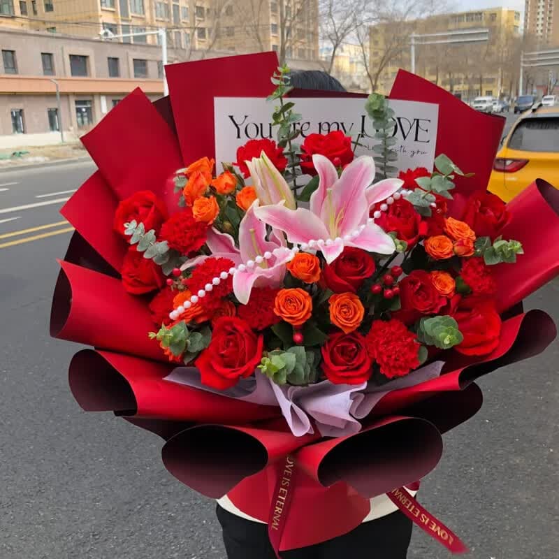 Satisfying and pleasing, a mix of roses, lilies, and carnations - Send birthday flowers to China