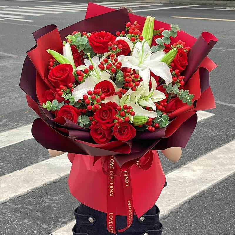 Just having you makes me feel warm. 19 red roses, 8 white lilies - Send love flowers to China